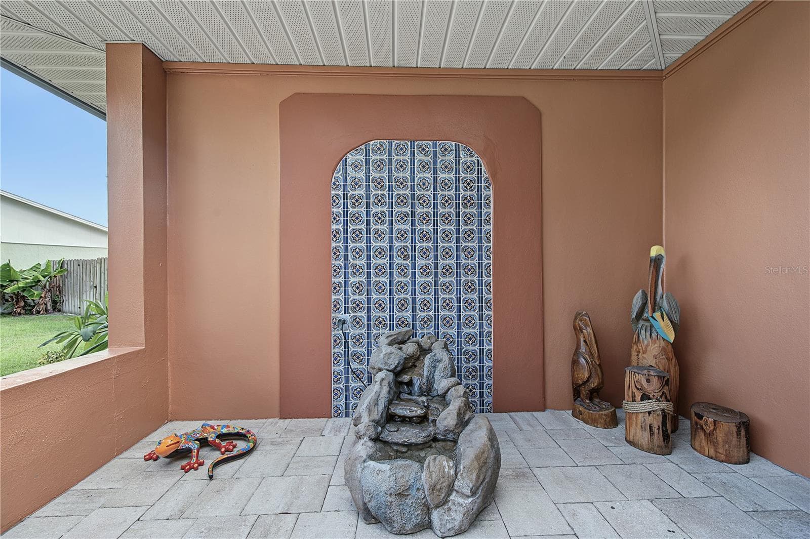 7. Mosaic Tile Inlet is Emphasized w/ Terra Cotta Paint to Accentuate the Unique Design.. the Fountain Trickling Water is a PLUS too.. - 112 PEACOCK CIR, SAFETY HARBOR