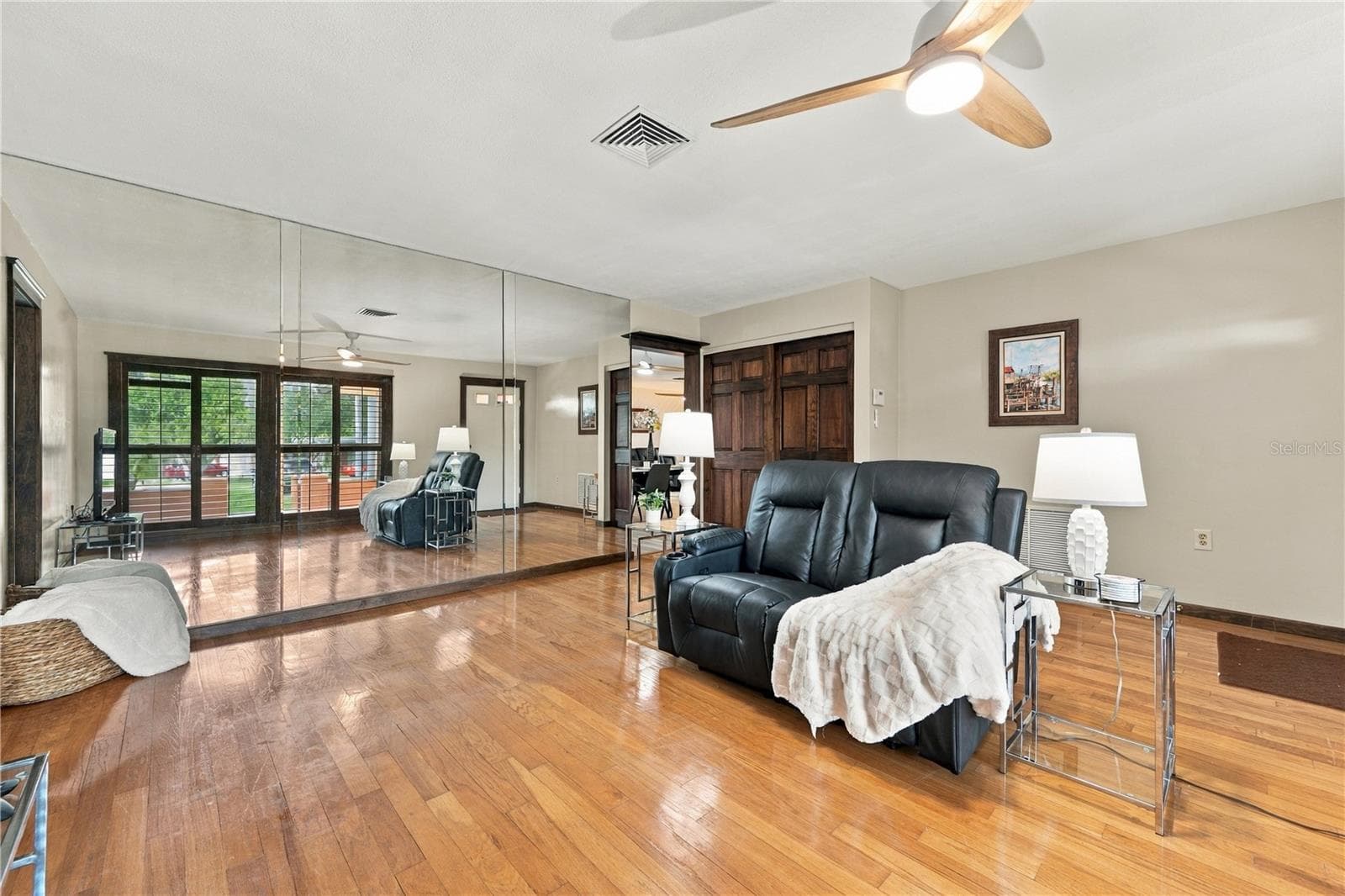 12.Front Living Room is (12.7 x 15') .. Features Timeless Wood Flooring that Lasts! - 112 PEACOCK CIR, SAFETY HARBOR