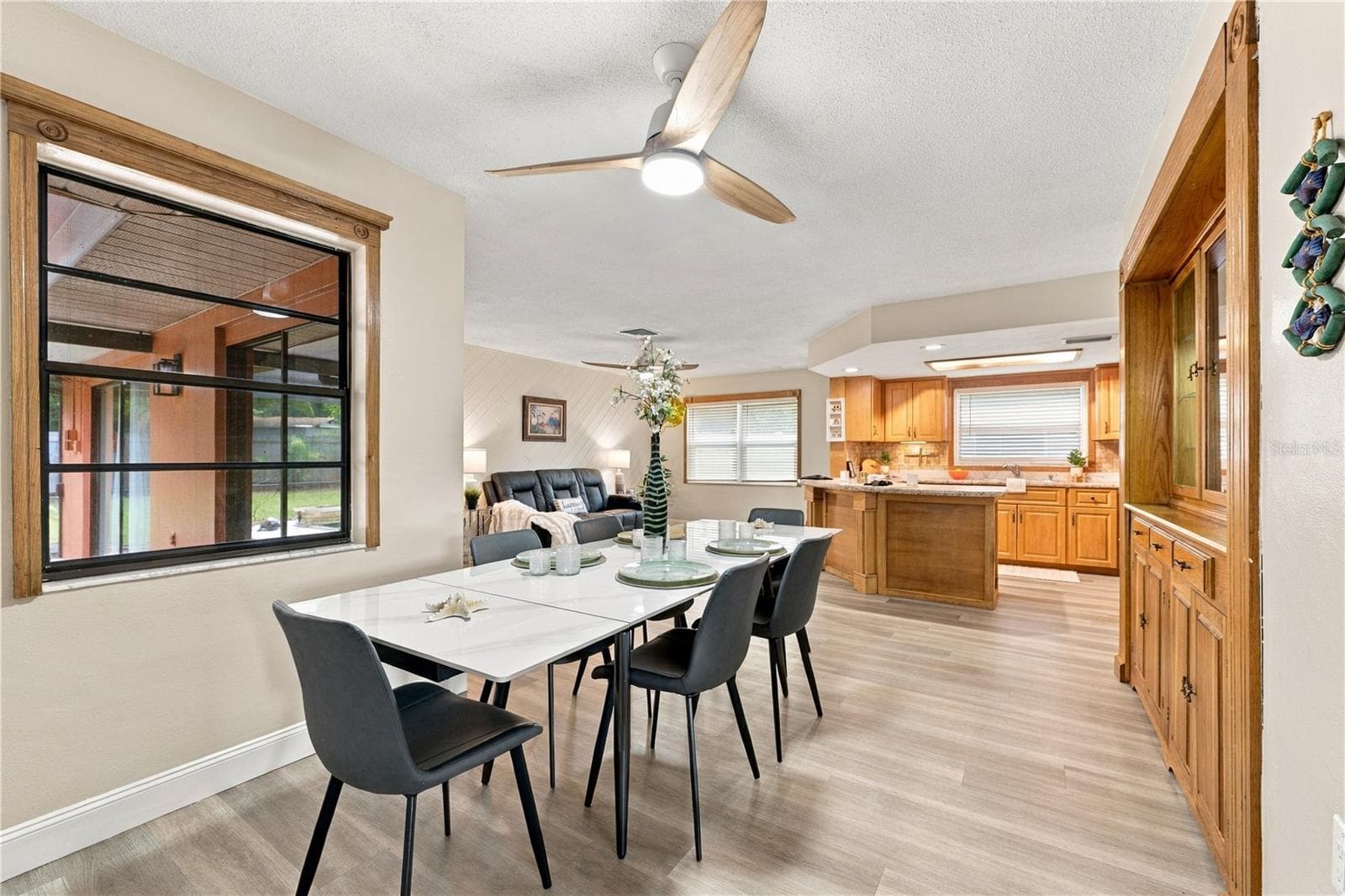13. The Dining Area (12.8 x 9') is Capable of Hosting Larger than Life Dinner Parties! - 112 PEACOCK CIR, SAFETY HARBOR