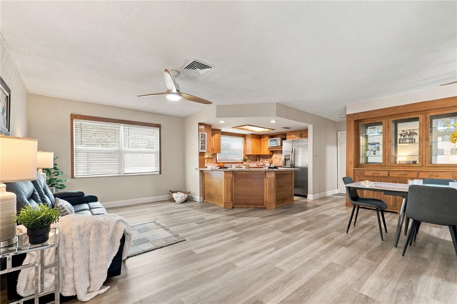 14. Everyone Wants a GREAT ROOM.. Here it IS.. Kitchen, Family Room, Dining Room! - 112 PEACOCK CIR, SAFETY HARBOR