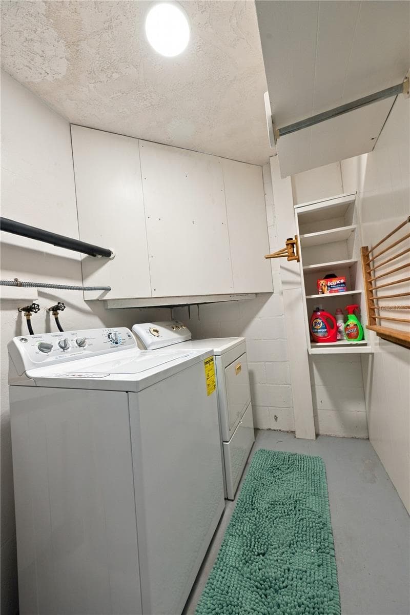 31. Laundry Room (5.8 x 9') is 'in' Kitchen, But Enclosed.. Run a Duct and You Gain Square Footage + Cooler Laundry Room in the Summer! - 112 PEACOCK CIR, SAFETY HARBOR