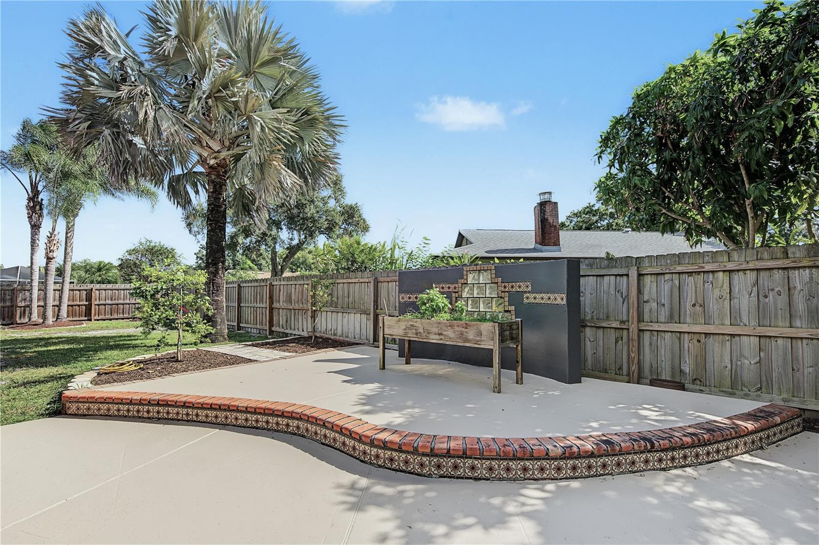 36. This is a Unique & Very Hosting Friendly Feature! 2-Tier Open Patio to Use as You Wish!! - 112 PEACOCK CIR, SAFETY HARBOR