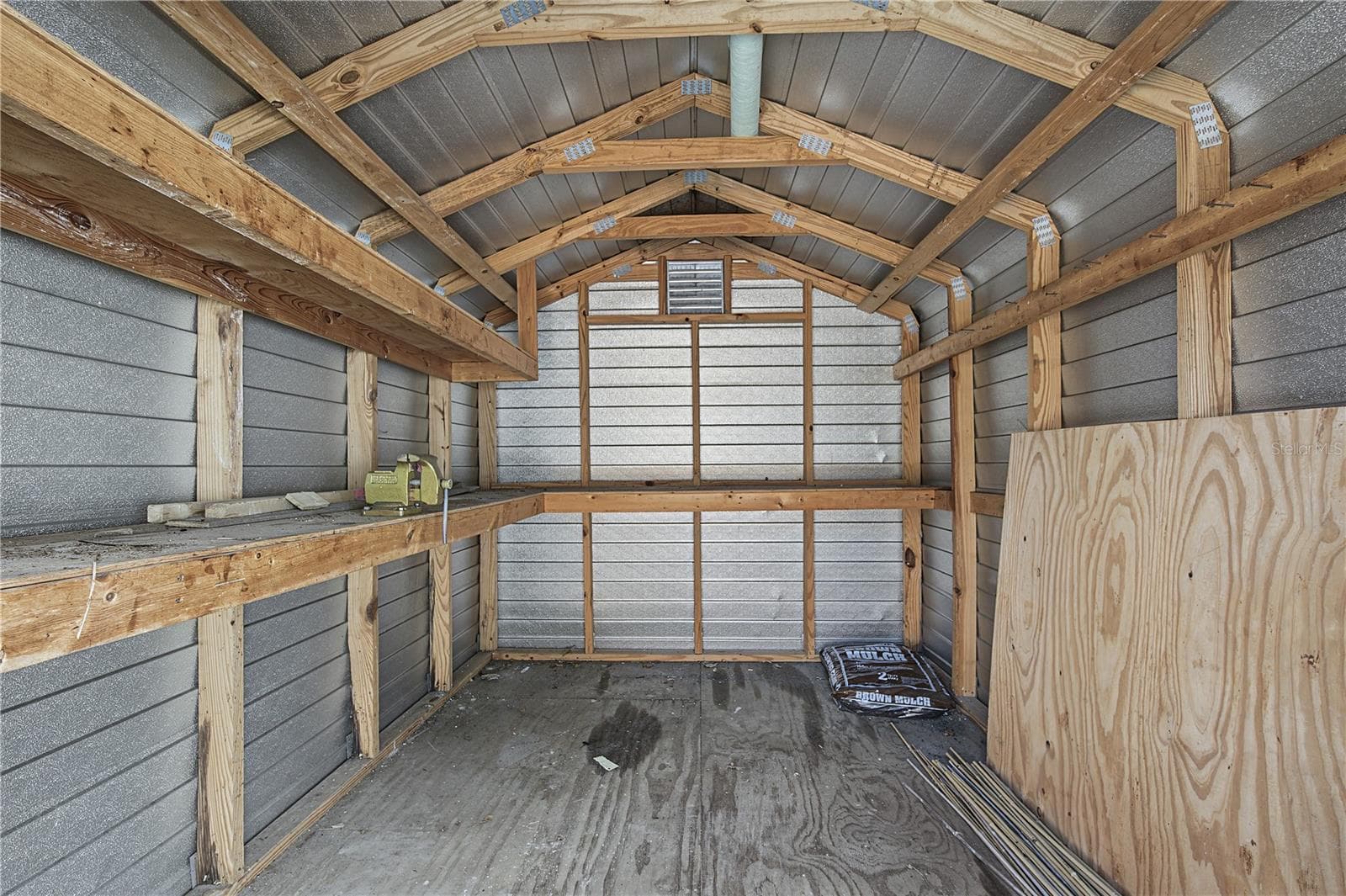 39. Elevated Full Size METAL Shed Rests on an Extended Concrete Pad.. HIGH & DRY for Your Storage Needs! Built/Installed to LAST! - 112 PEACOCK CIR, SAFETY HARBOR