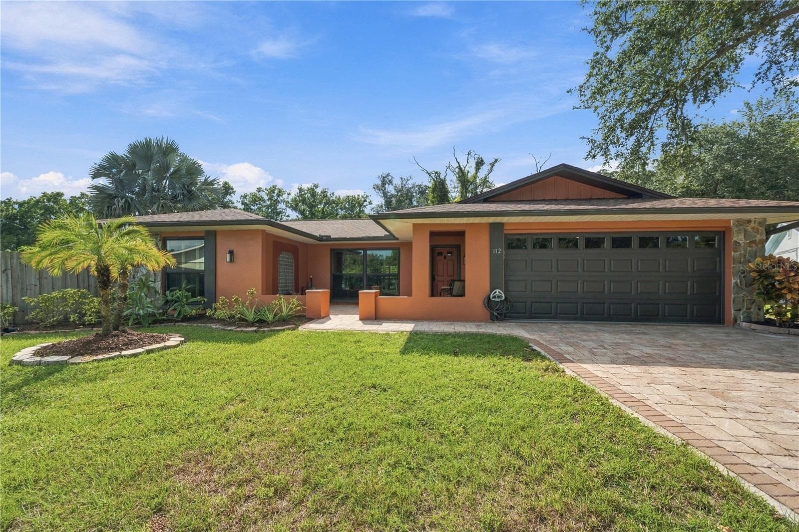 41a. FULL EXTERIOR Freshly Painted Warm Welcoming Hues... This Home is Set Apart from the Rest.. In a Good Way! - 112 PEACOCK CIR, SAFETY HARBOR