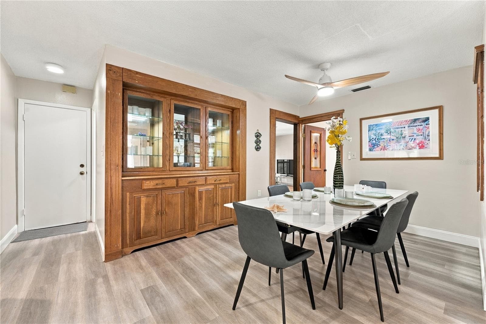 46. Dining Area (12.8 x 9.1) Within Great Room is Plenty Spacious.. Table Extended w Both Leaves to Show the Capacity for Dining.. - 112 PEACOCK CIR, SAFETY HARBOR