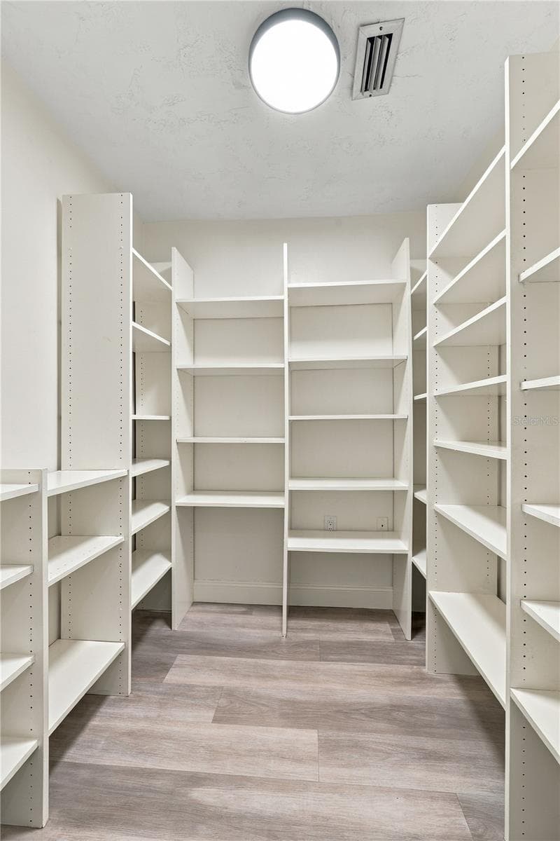 47a. PANTRY to Make Your Girlfriends Jealous, Lol! (6.3 x 6.4) - I'm TOLD This Room IS Plumbed to be a Bathroom.. This Floor plan Typically Has a Bathroom in This Space! - 112 PEACOCK CIR, SAFETY HARBOR