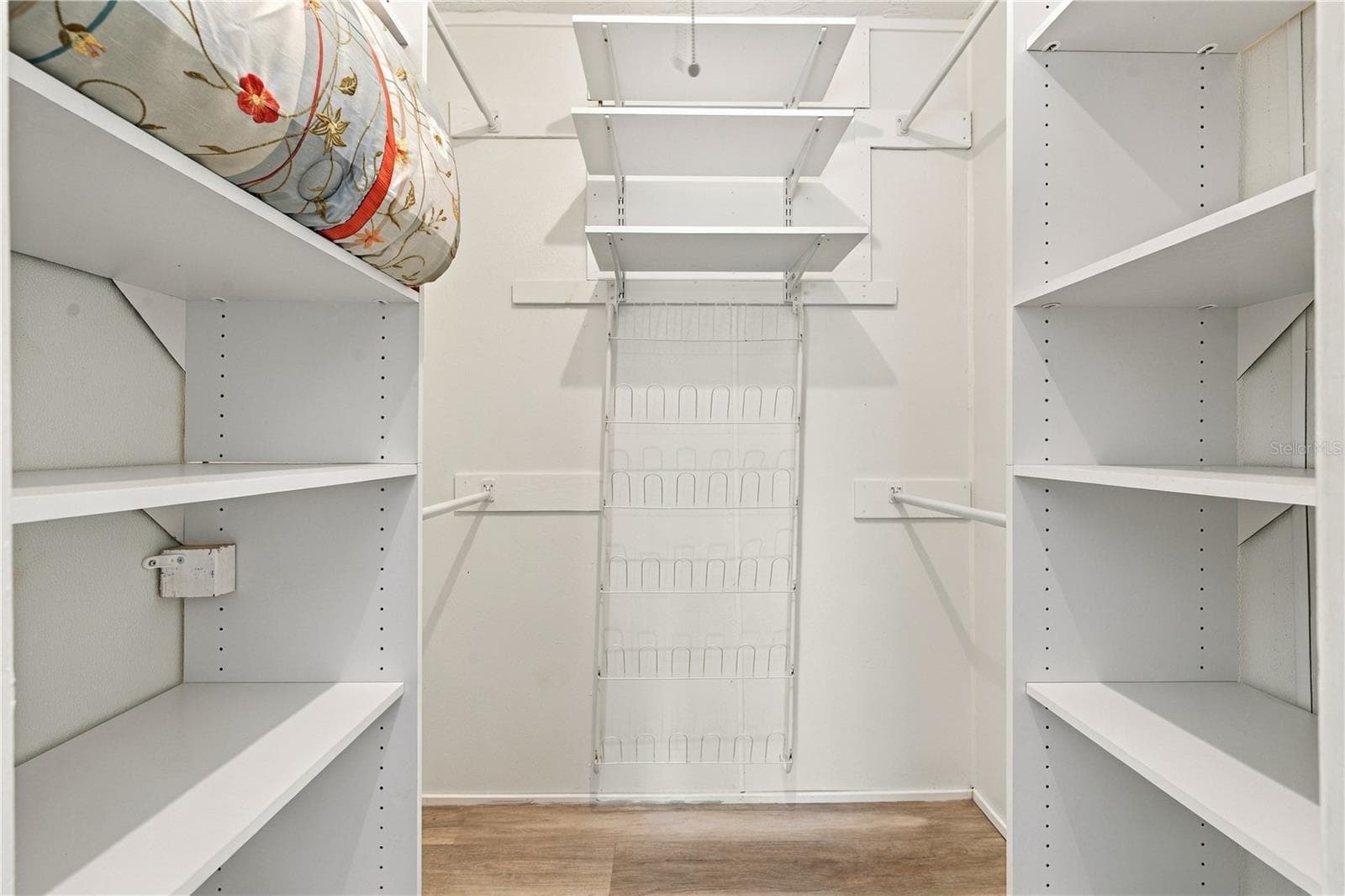62. Walk in Closet (4.9 x 5.7') for Primary Bedroom .. Plenty of Storage! - 112 PEACOCK CIR, SAFETY HARBOR
