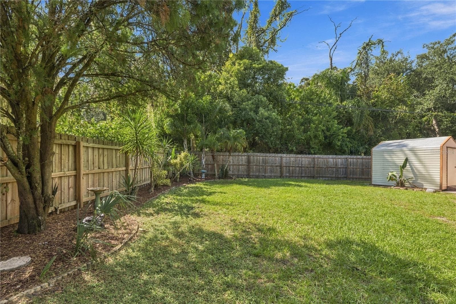74. 1/4 Acre Lot Means a LOT of Land.. A Large Chunk of it is in the Backyard.. Which is Where you WANT Most of It.. Come Check it Out! - 112 PEACOCK CIR, SAFETY HARBOR