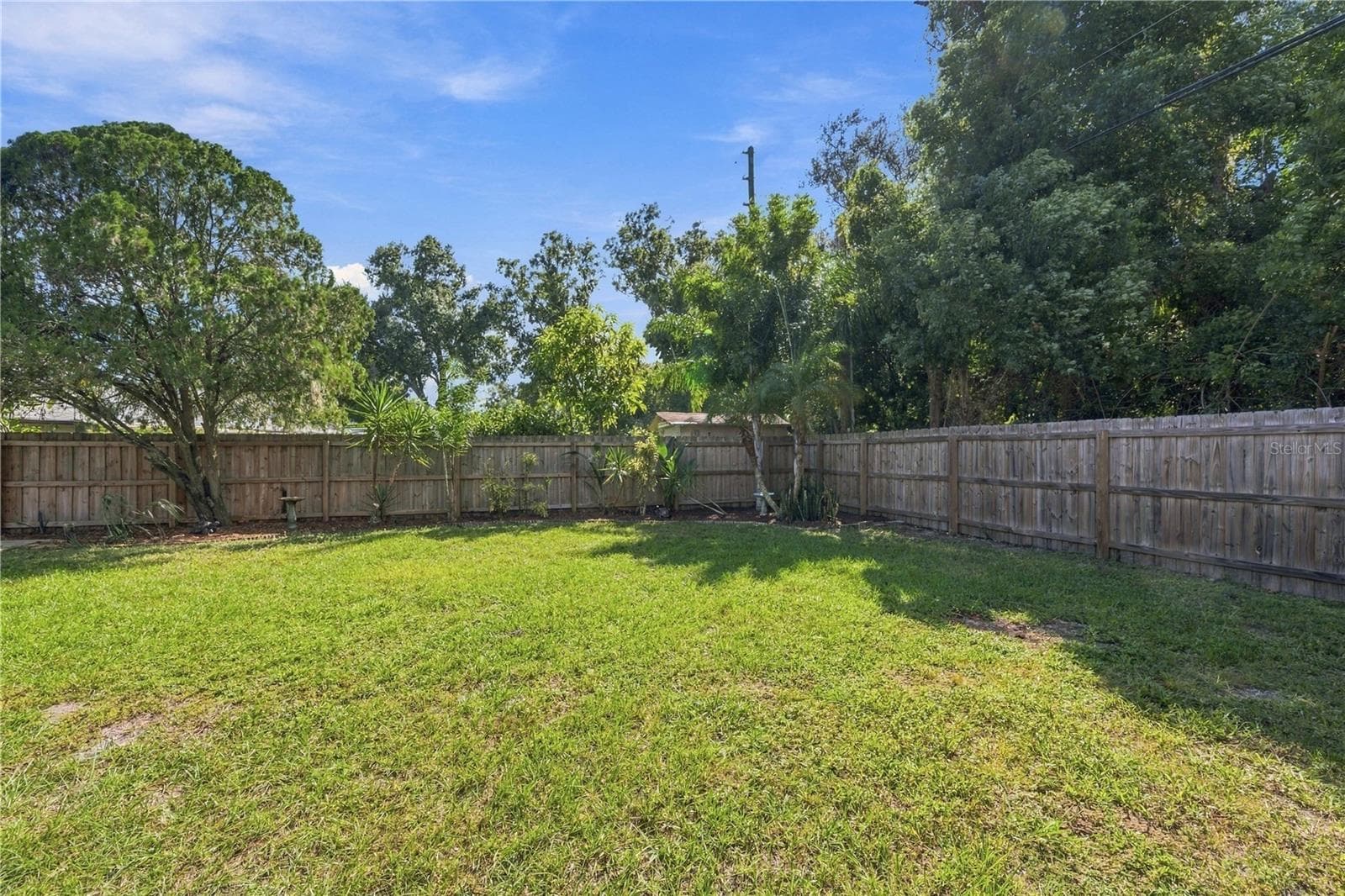 75. FULLY FENCED (New-ish Fence!) BACKYARD.. Means Privacy, Safety, Good Looking Space.. - 112 PEACOCK CIR, SAFETY HARBOR