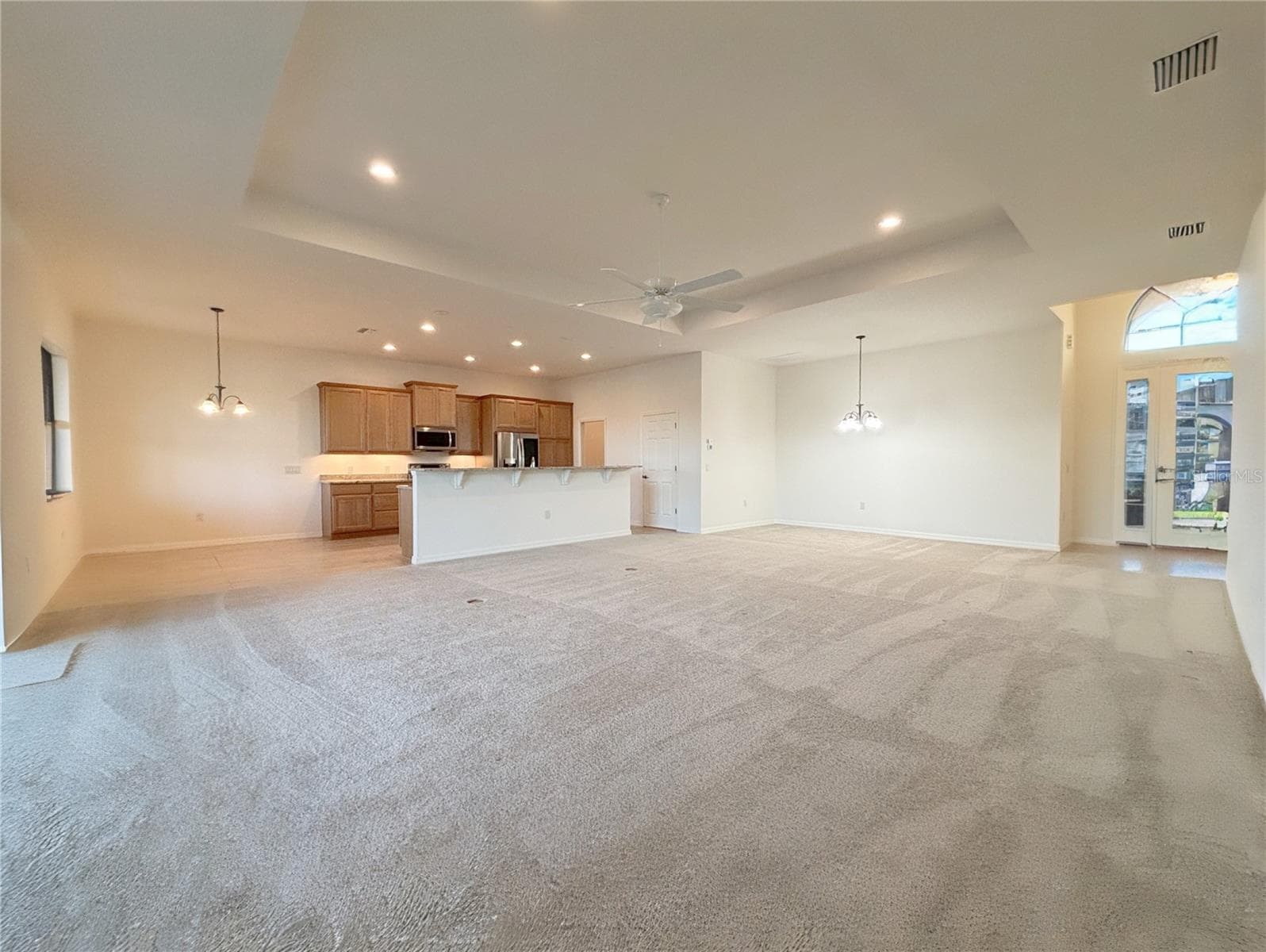 LR area with Trey Ceiling - 6240 PINEHURST LOOP, WINTER HAVEN
