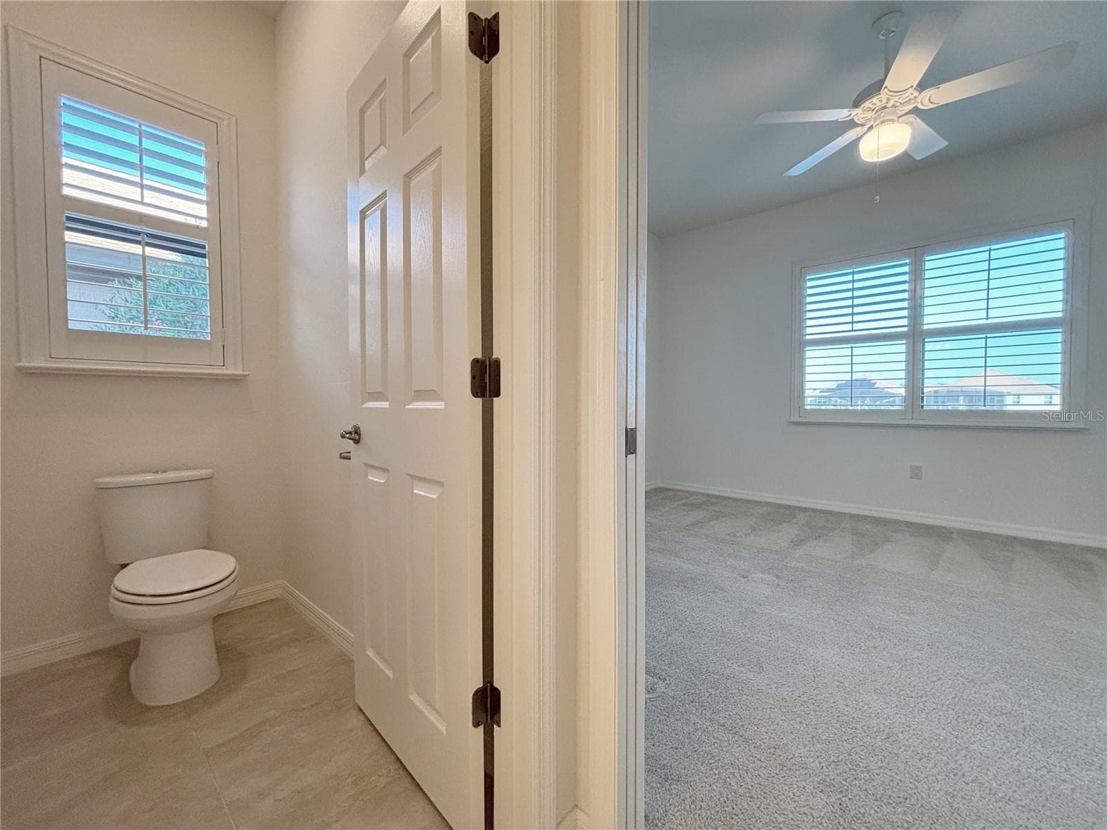 Water Closet in the Primary Bath - 6240 PINEHURST LOOP, WINTER HAVEN