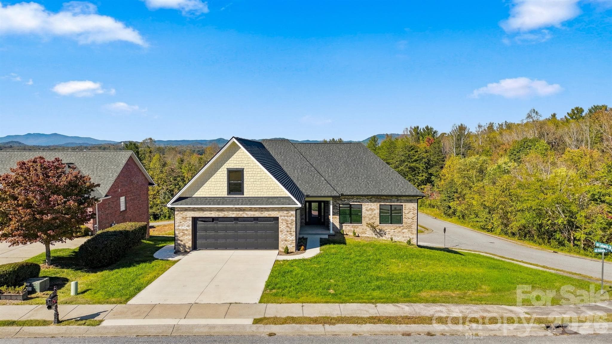 Welcome home to this stunning all brick new construction with full unfinished basemen - 426 Huntington Woods Street SE, Lenoir