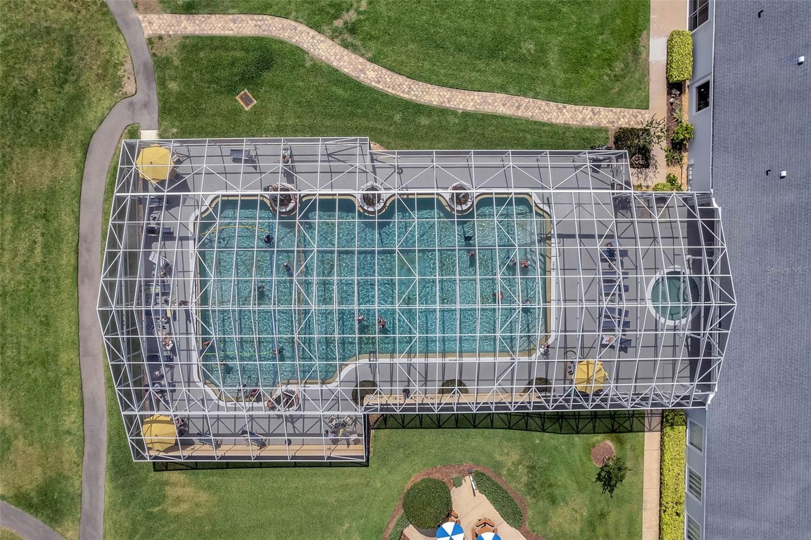 Heated, screened community pool. - 4900 CANOE CT, TAVARES
