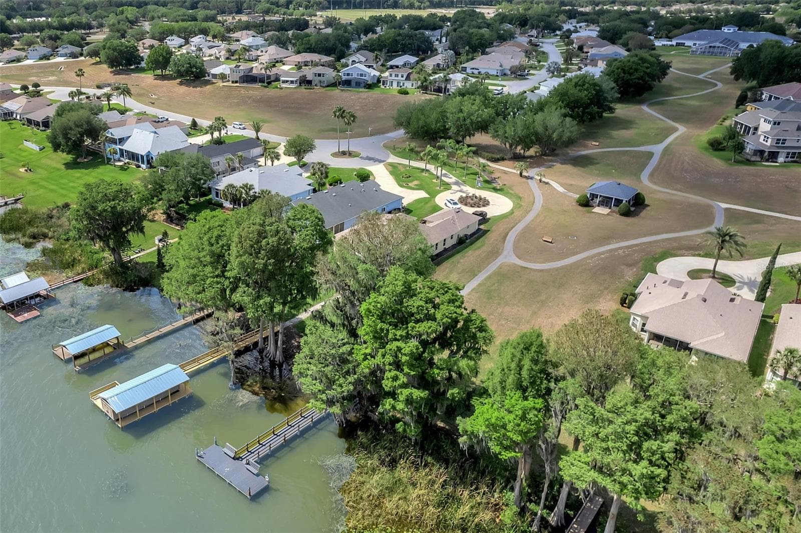 Lakefront and docks on Little Lake Harris. - 4900 CANOE CT, TAVARES
