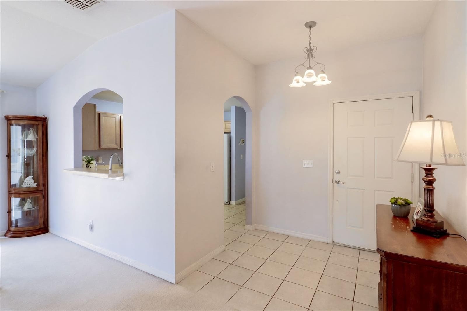 Foyer features tile flooring - 3437 GRENVILLE DR, WINTER HAVEN