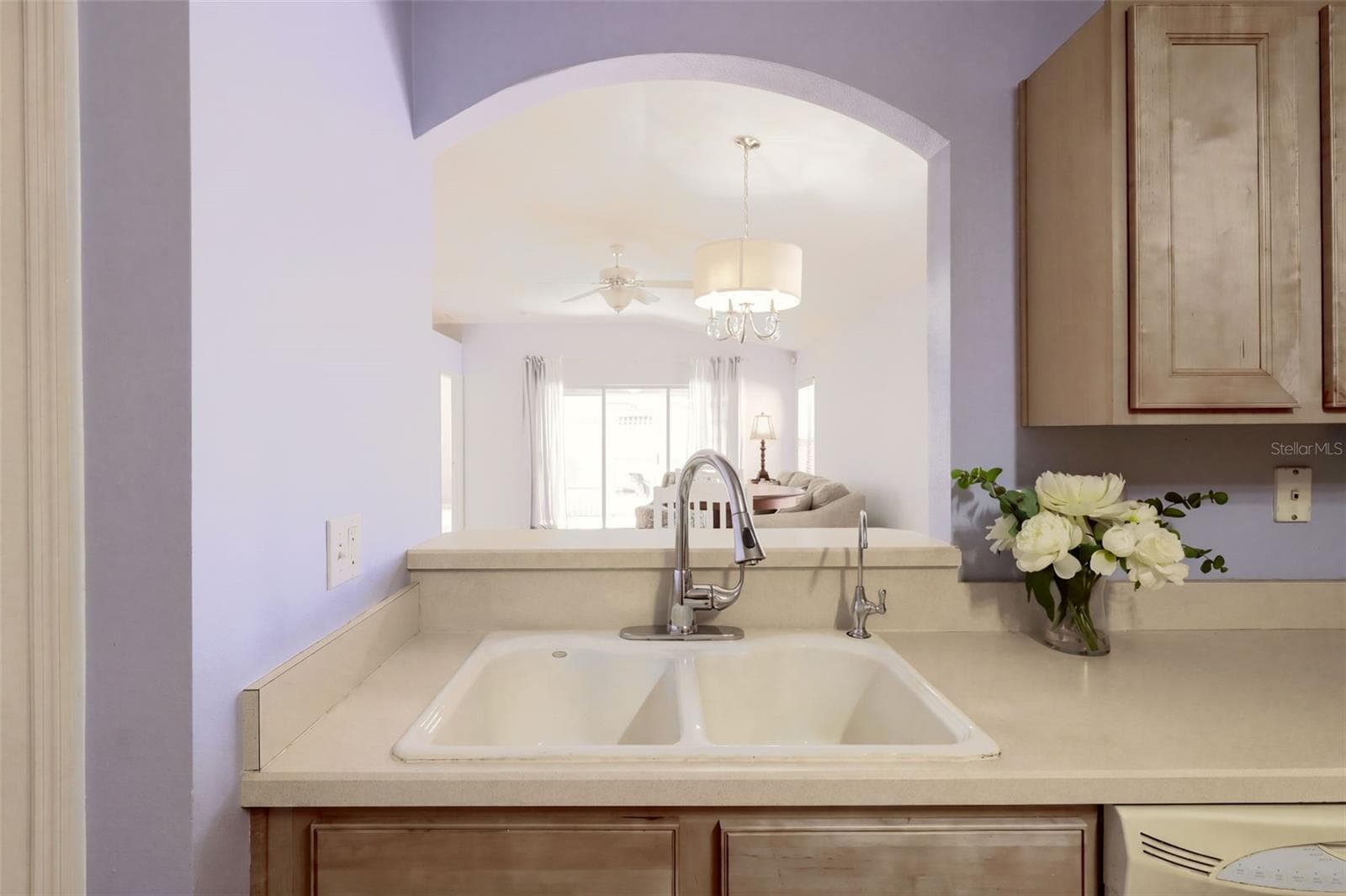 Reverse osmosis at the kitchen sink, Gooseneck Faucet and convenient pass thru into the dining room - 3437 GRENVILLE DR, WINTER HAVEN
