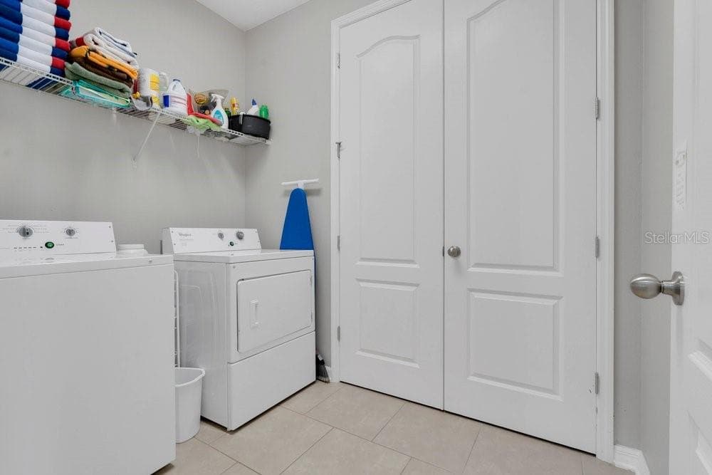 Upstairs laundry room and hvac closet - 10019 MADISON BANKS ST, ORLANDO