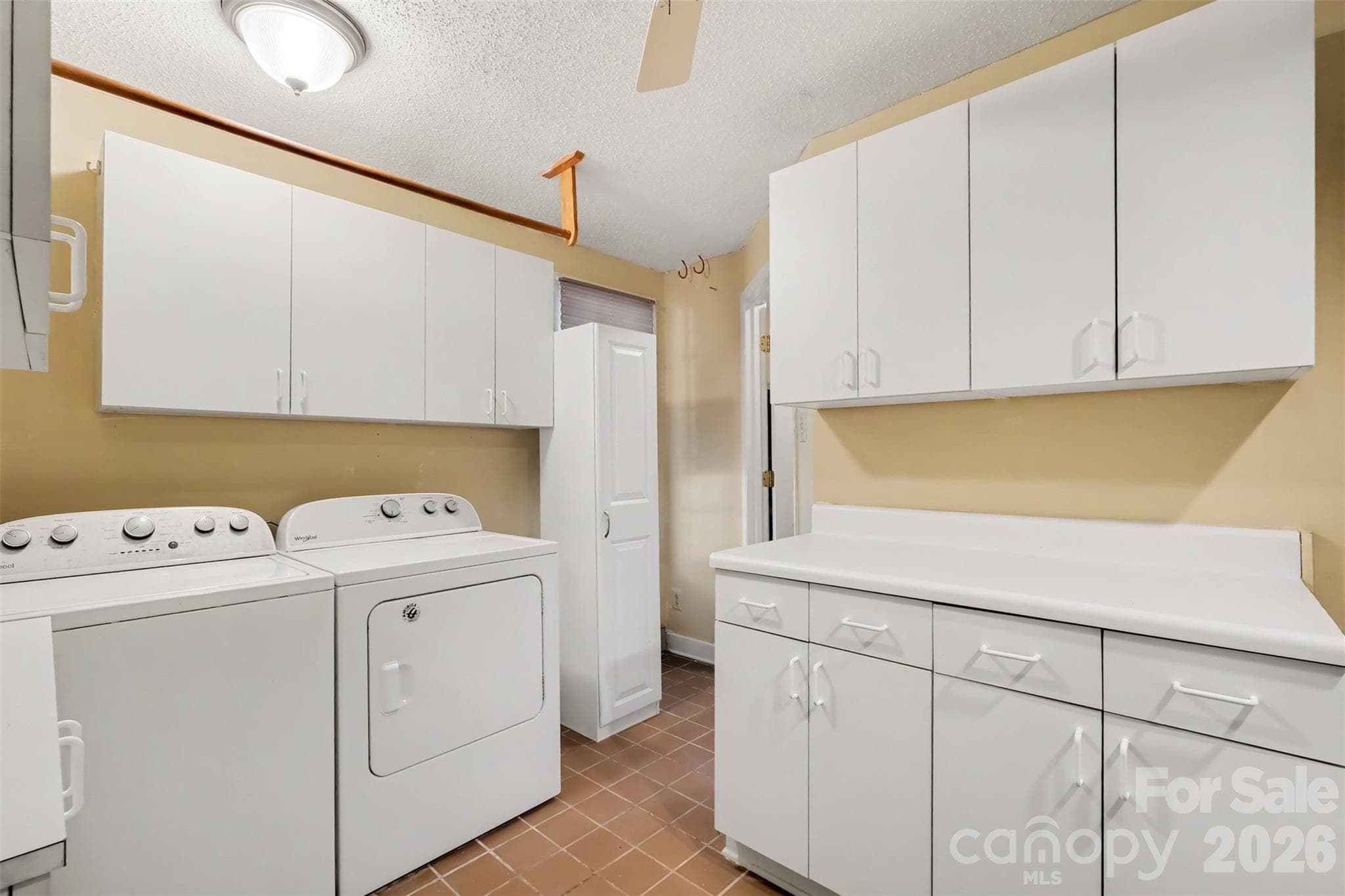 Laundry room with lots of storage - 225 Edgewood Drive, Statesville