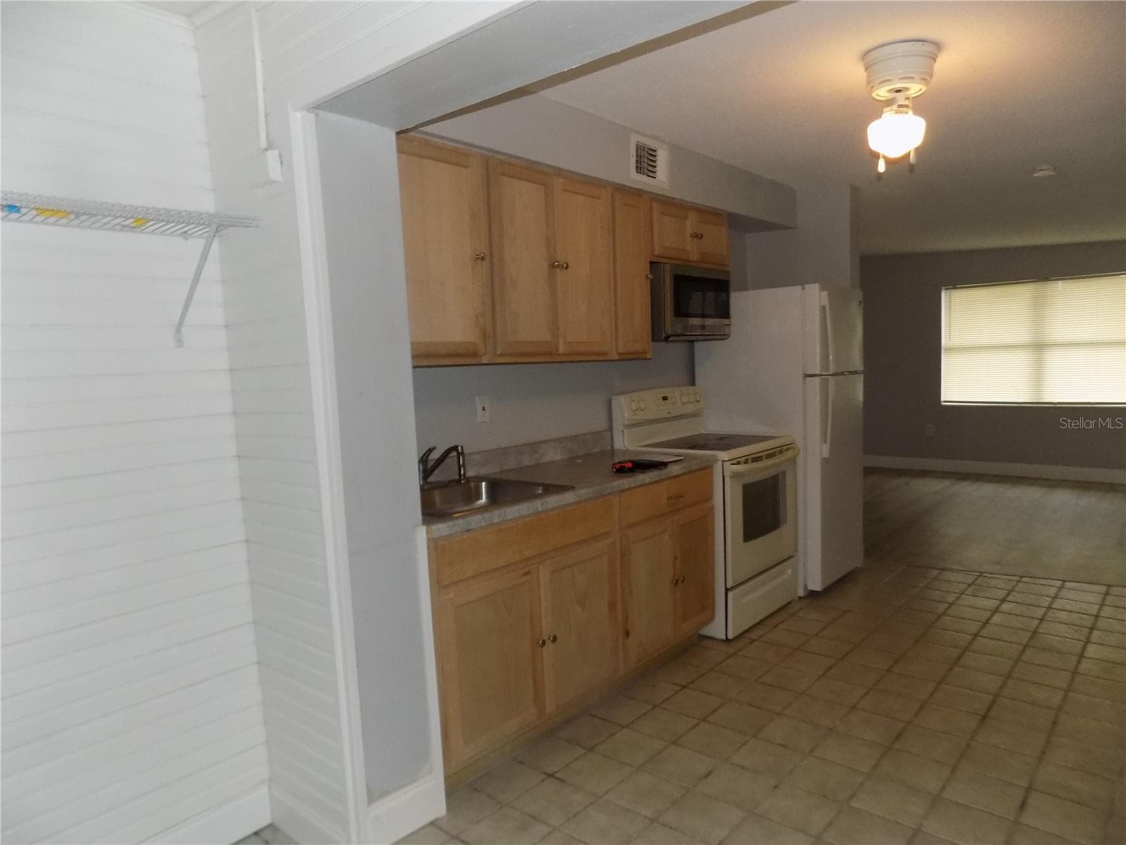Kitchen view from Living Room - 6623 SANDRA DR, PORT RICHEY
