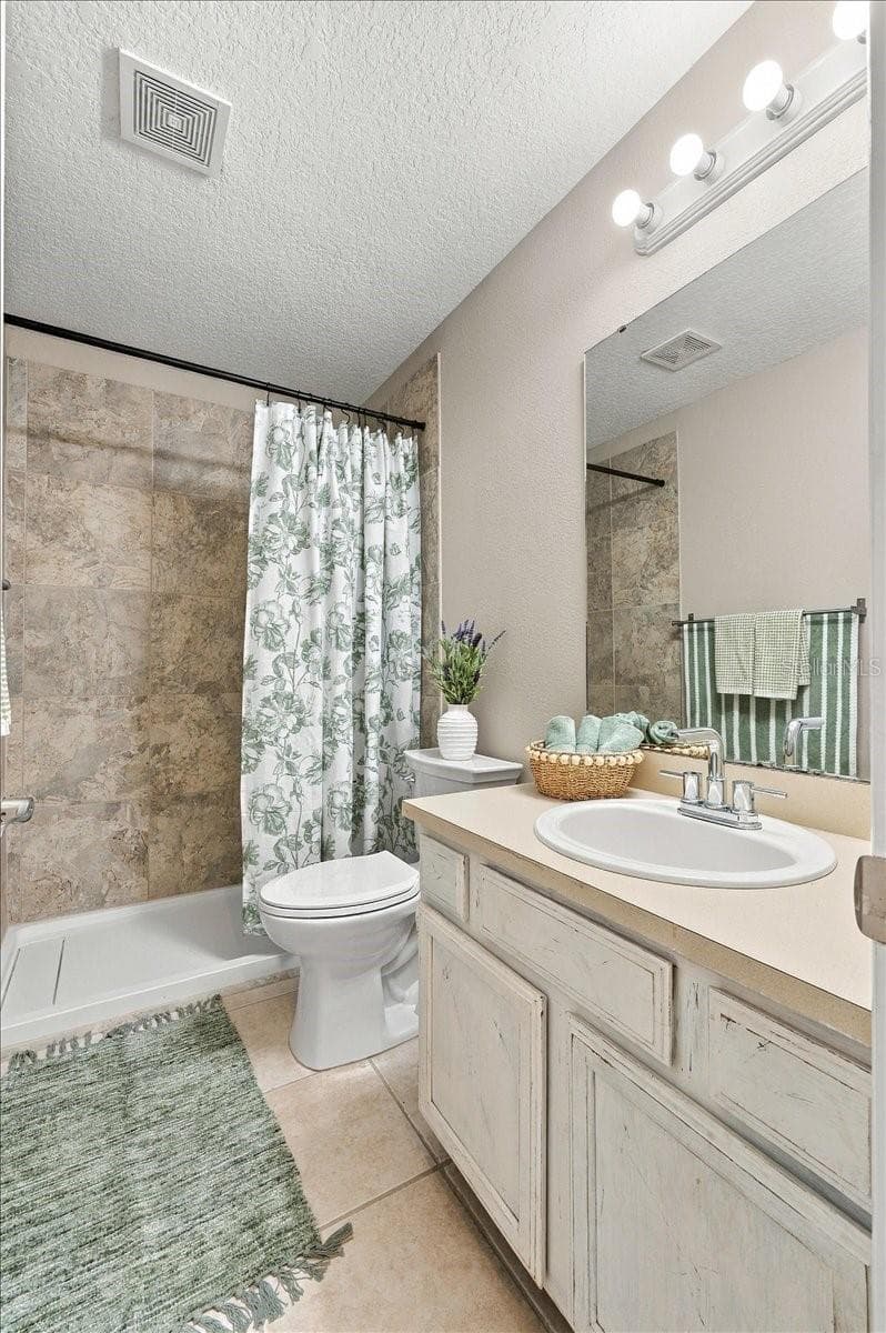 Guest bath - 5244 QUIET CREEK LN, LAKELAND