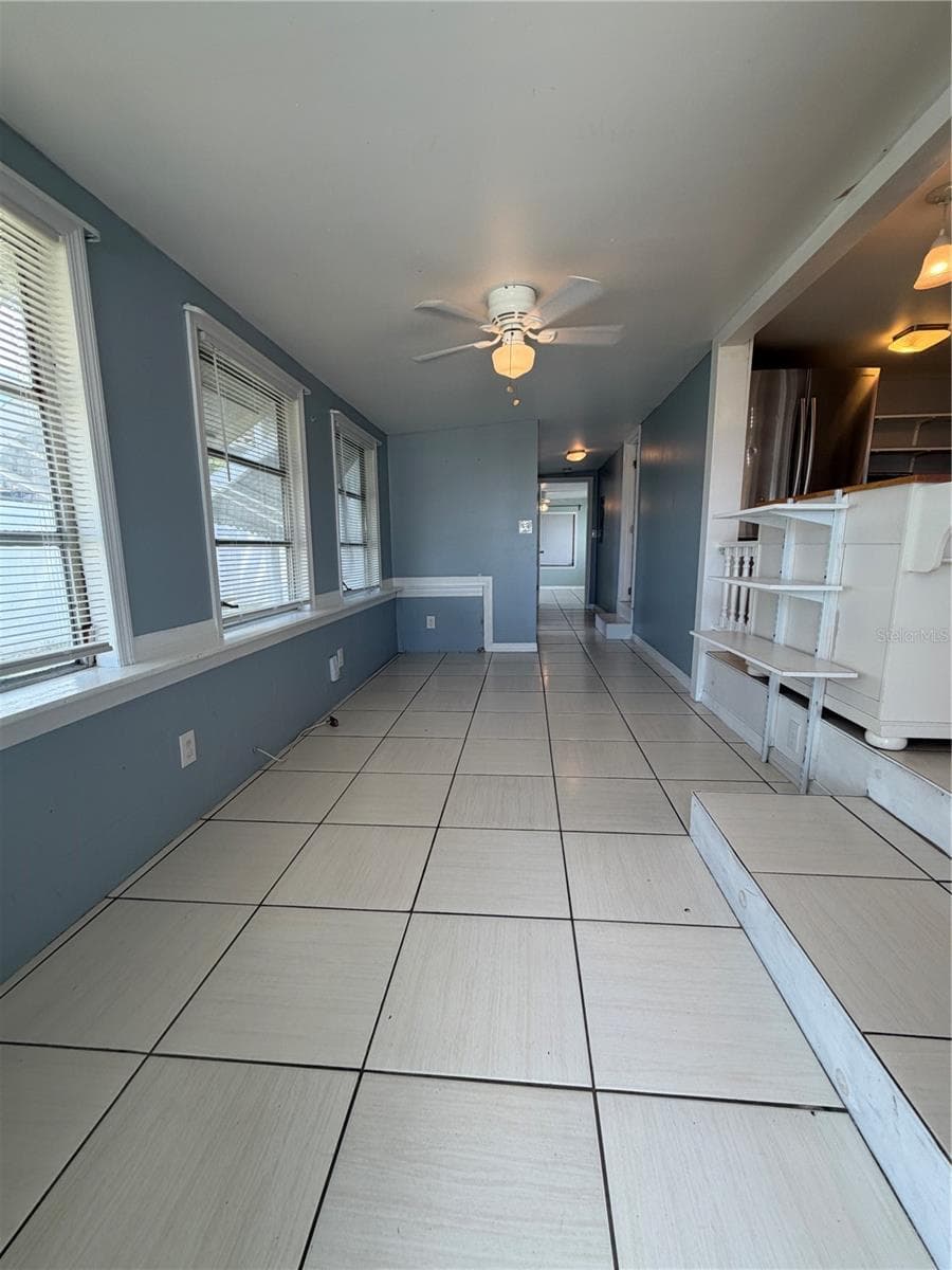 Main living area next to kitchen. - 4120 BUENA VISTA LN, HOLIDAY