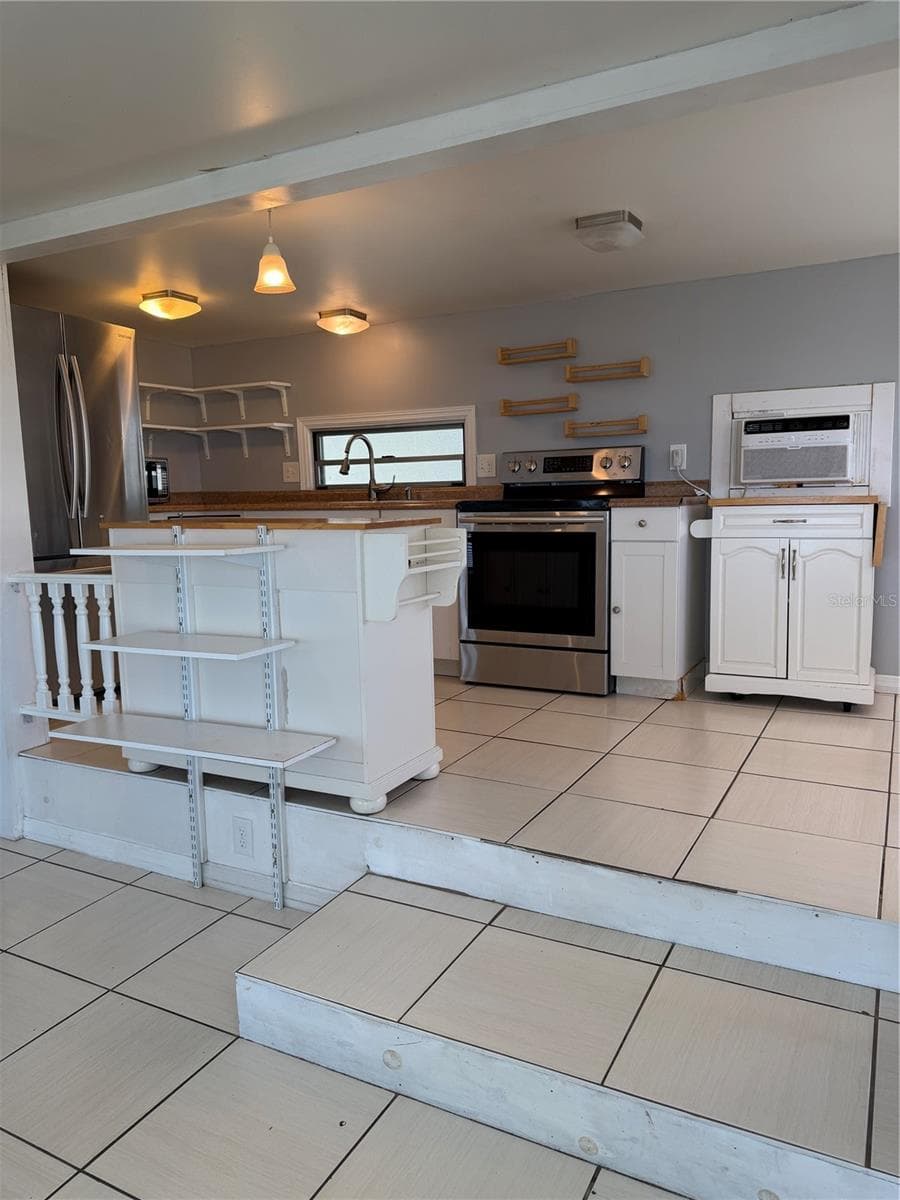 Another view of the kitchen - 4120 BUENA VISTA LN, HOLIDAY