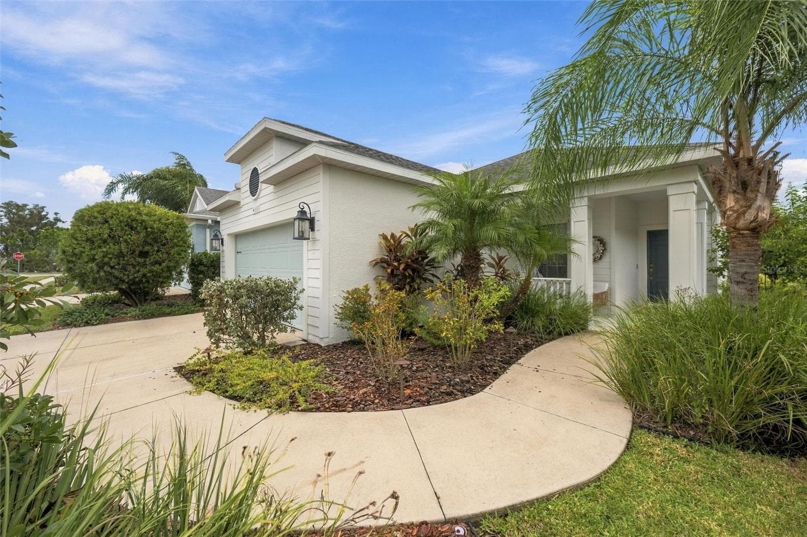 Nature-filled entry path - 11115 SAND PINE LN, PARRISH