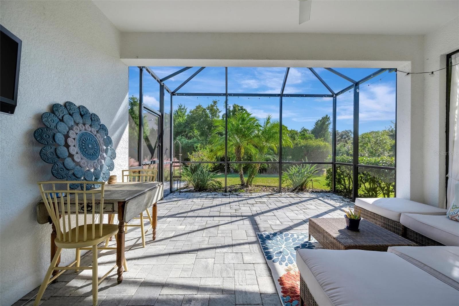 Expanded, pavered lanai awaits your quiet evenings - 11115 SAND PINE LN, PARRISH