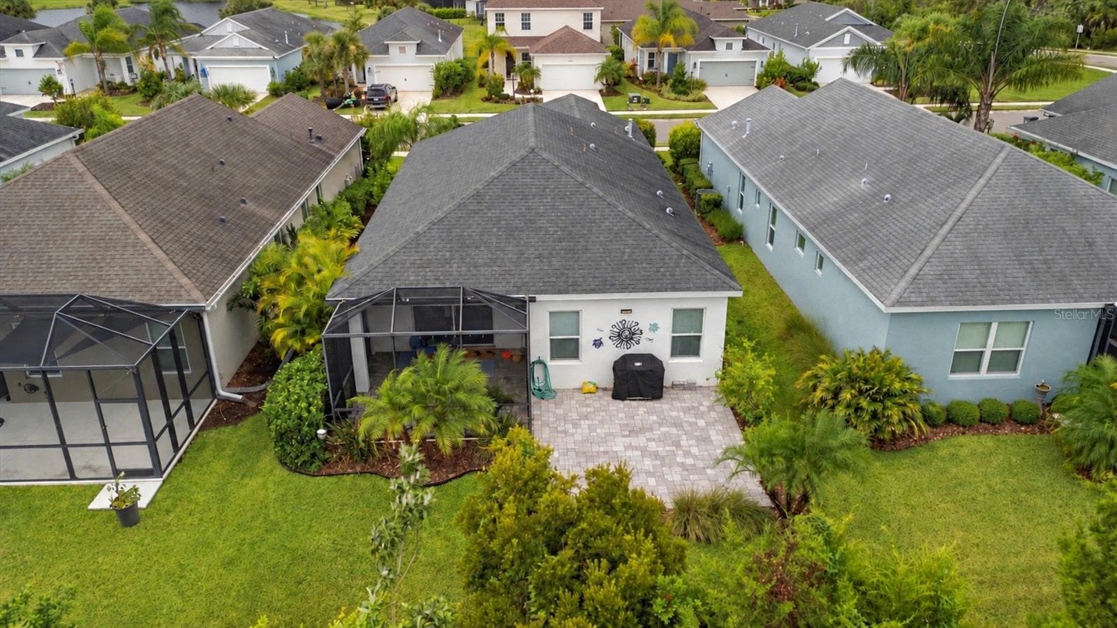 Two pavered patio spaces - 11115 SAND PINE LN, PARRISH