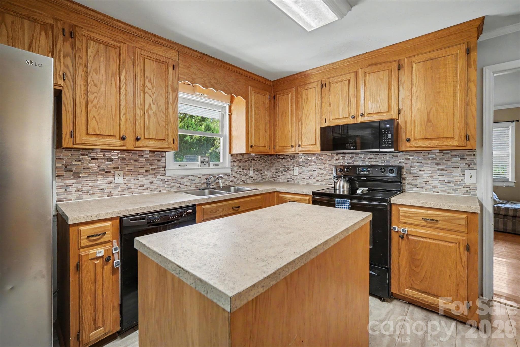 Kitchen with movable island - 1620 Forest Lake Drive, Rock Hill