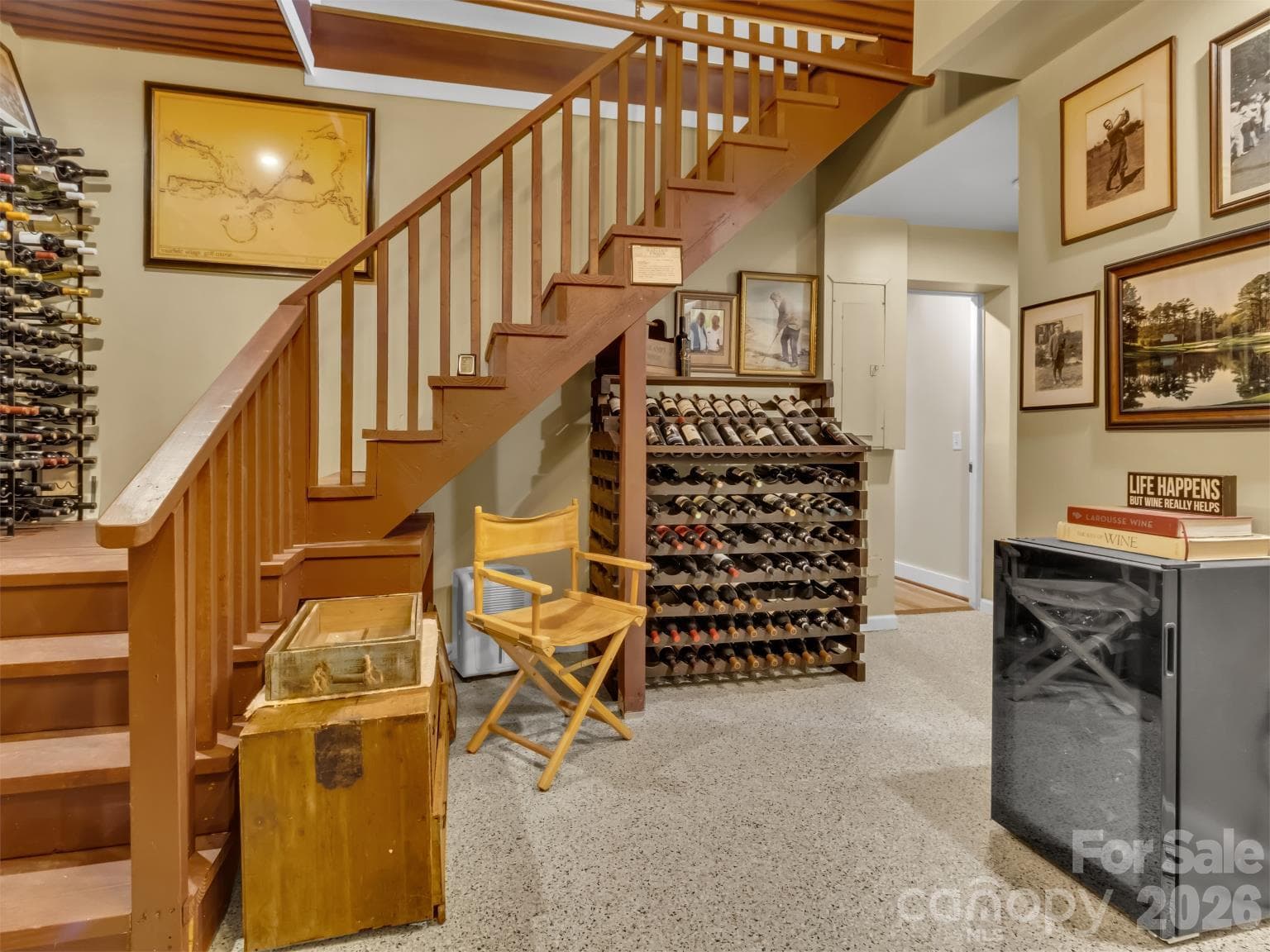 Walk down the steps thru the wine room to the apartment and the studio. Or the second and third bedroom - 91 Worsham Drive, Waynesville