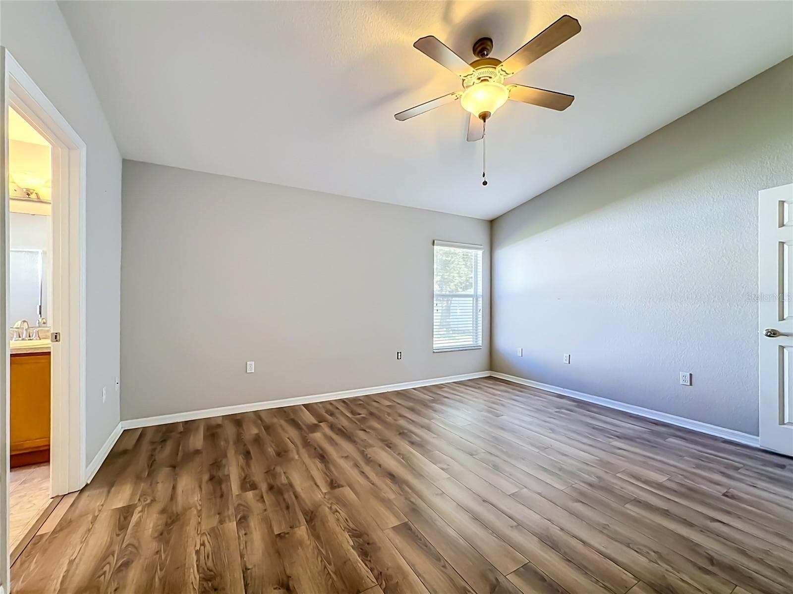 Primary Bedroom with En Suite Bathroom - 10852 STANDING STONE DR, WIMAUMA
