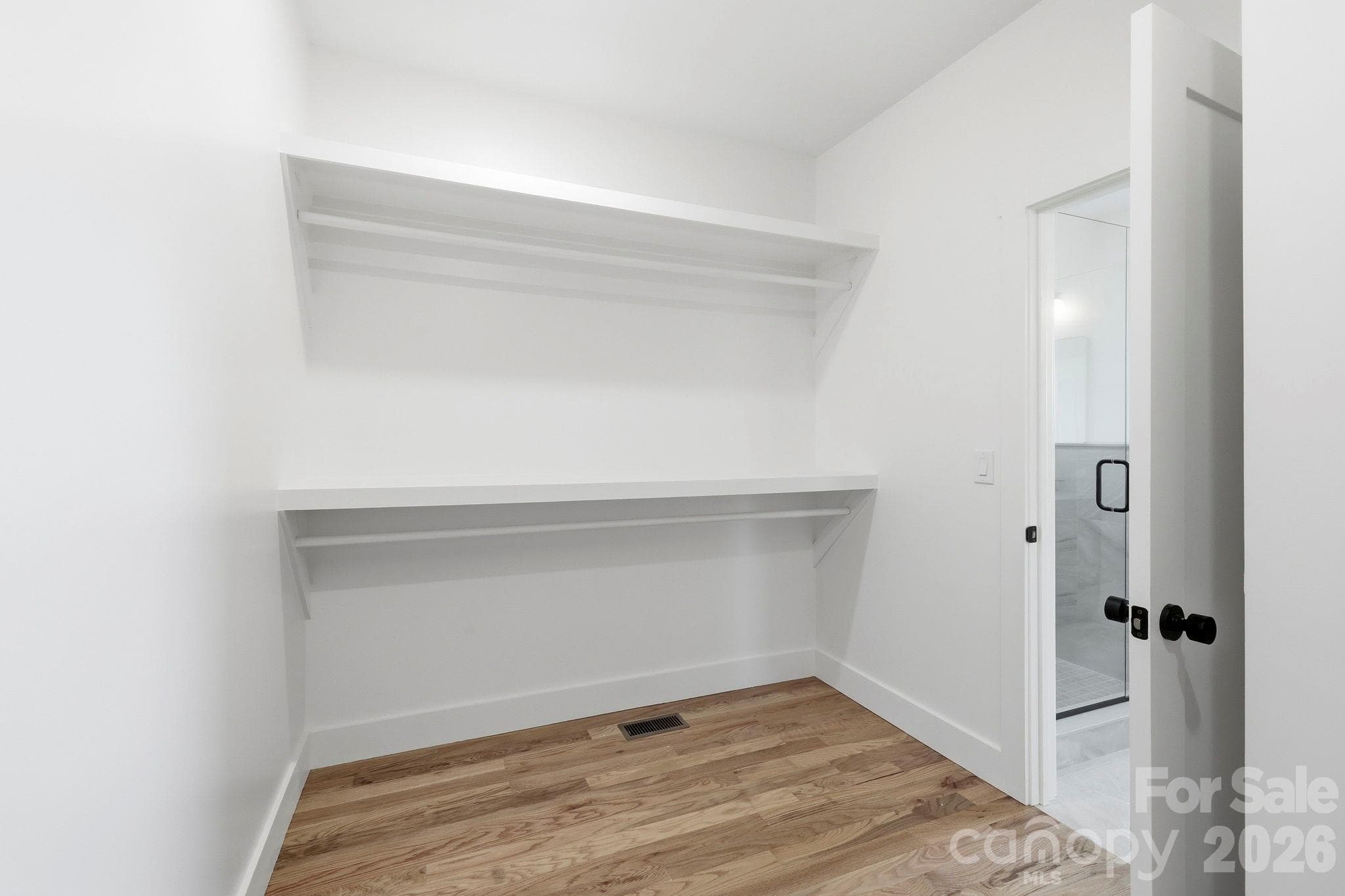 Huge walk-in closet in the primary bedroom - 20 Laurel Loop, Asheville