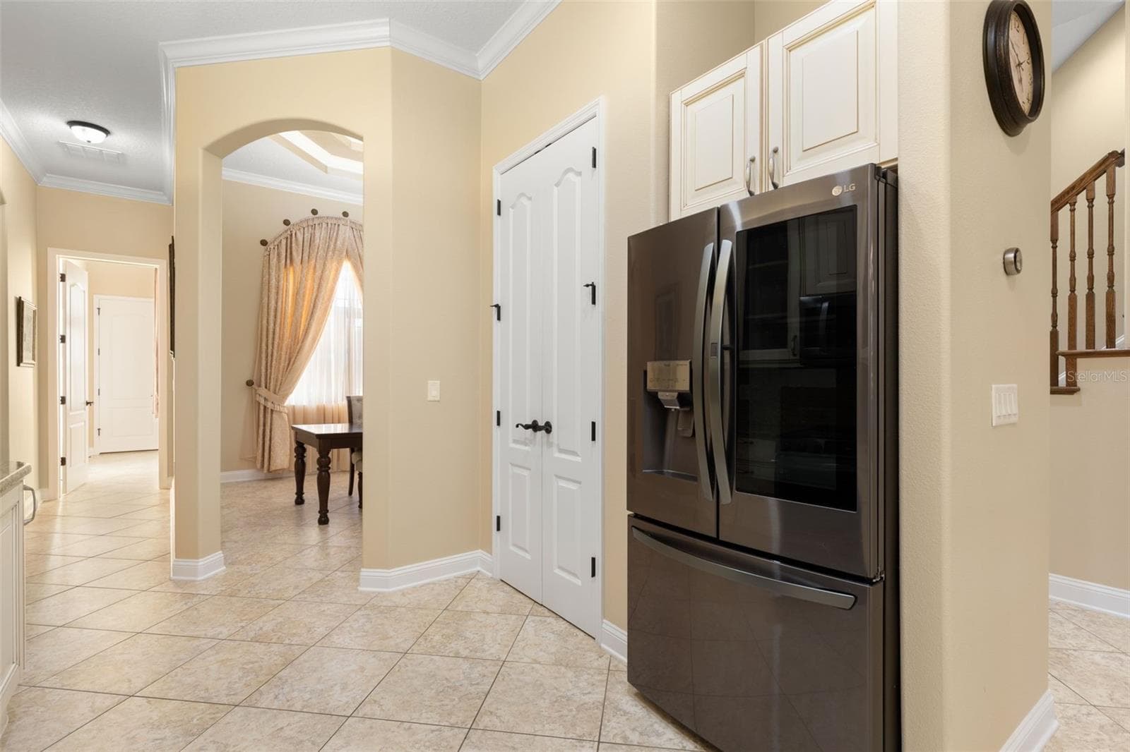 Thoughtfully designed for everyday convenience, the kitchen connects easily to the adjoining dining area. - 25 EMERALD LAKE CT, PALM COAST