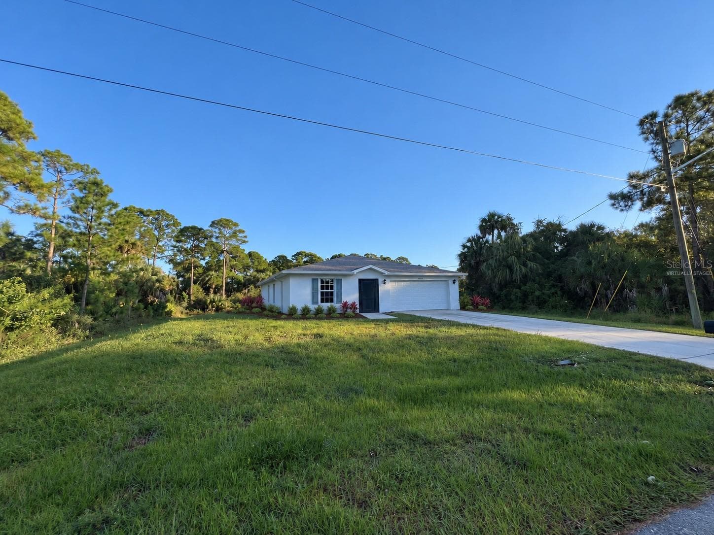 Front yard - 3404 61ST ST W, LEHIGH ACRES