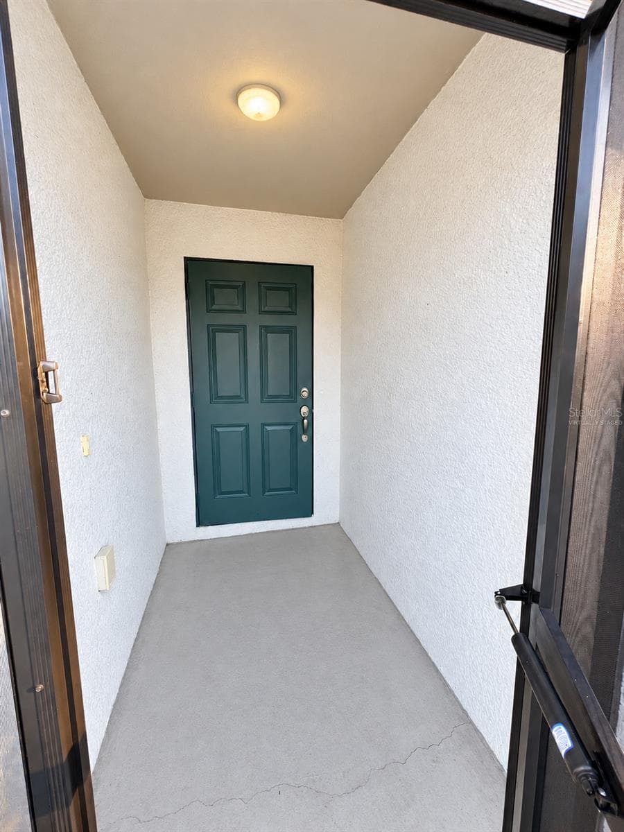 Covered entry - 3404 61ST ST W, LEHIGH ACRES