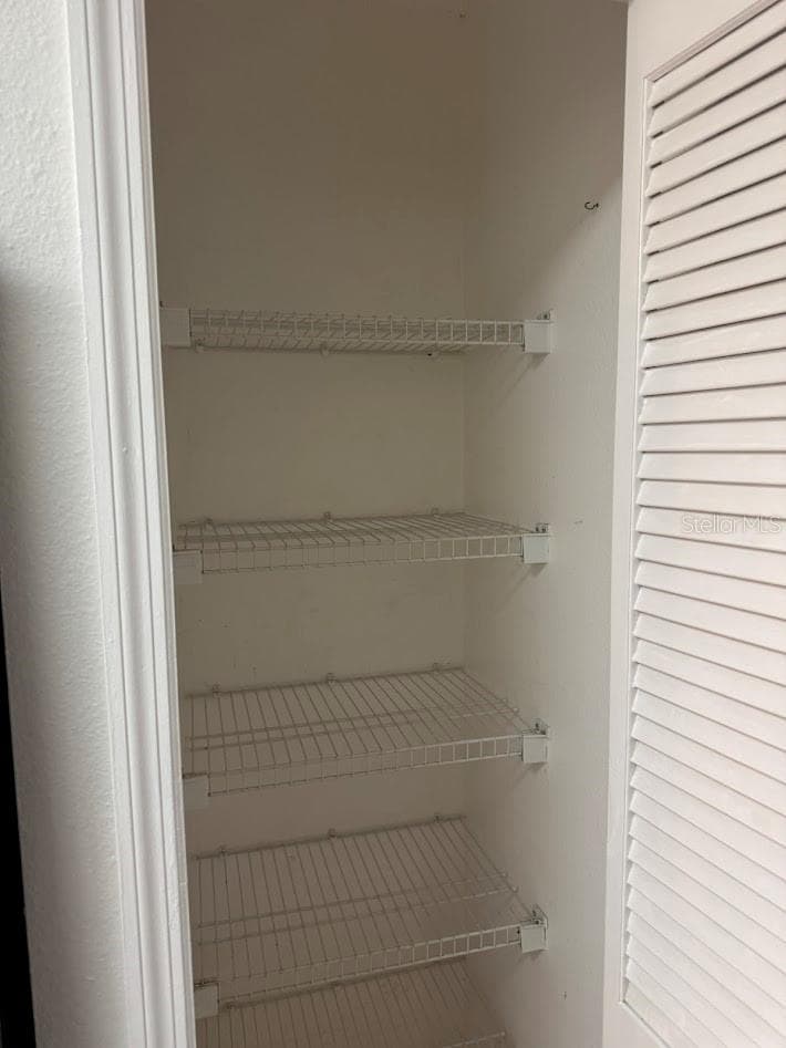 2nd bedroom closet - 12144 BRUCETON WAY #101, ORLANDO