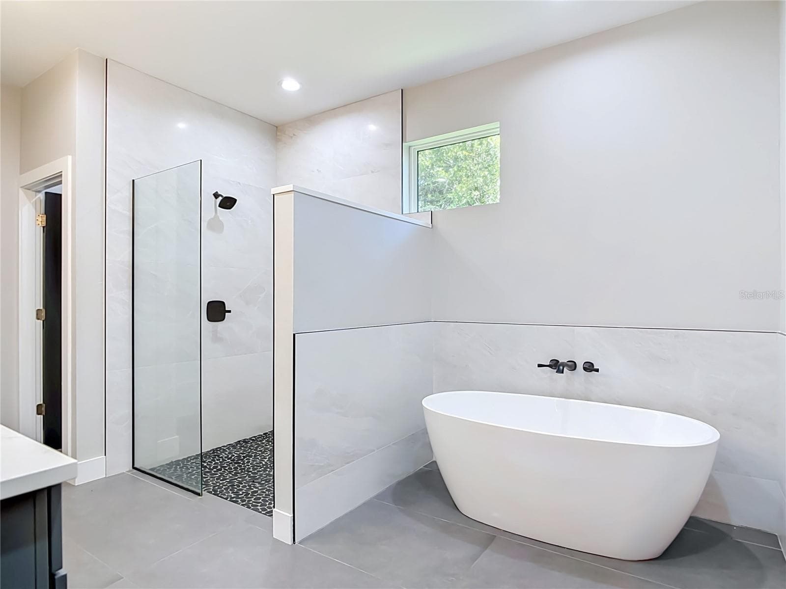 Primary Bathroom with separate garden tub and walk in shower - 17237 KELLOG AVE, PORT CHARLOTTE