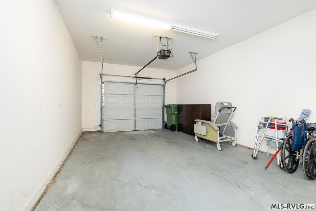 Attached Garage - Dresser pictured does NOT convey - 128 Savannah Circle, Roanoke Rapids NC 27870, Roanoke Rapids