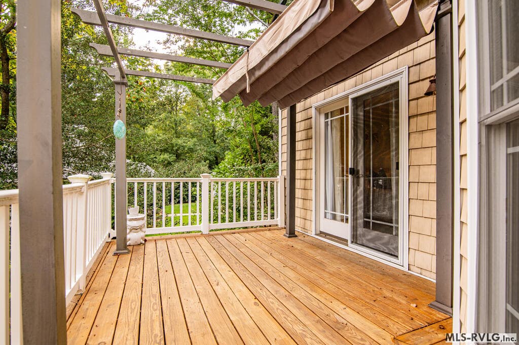 Where Lake Memories are Made, Step outside to this spacious deck, perfect for morning coffee, family dinners and relaxing evenings with family and friends. - 243 Woodland Rd, Littleton NC 27850, Littleton