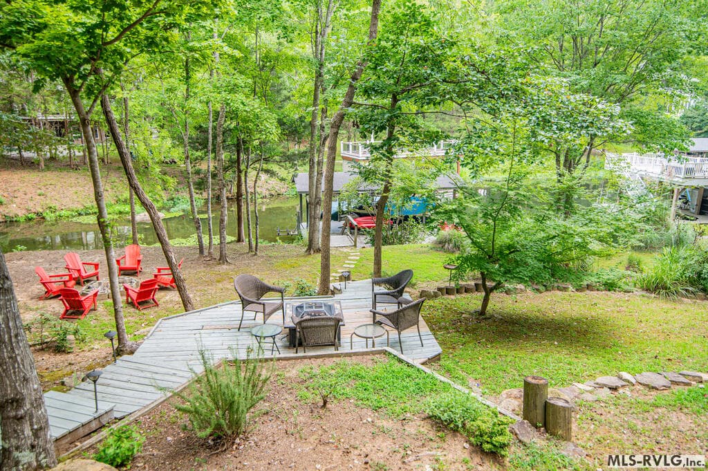 Convenient Downstairs Bathroom, Lake Day Ready! – Convenient downstairs full bath with shower—perfect for rinsing off and freshening up after a fun-filled day on the lake! - 243 Woodland Rd, Littleton NC 27850, Littleton