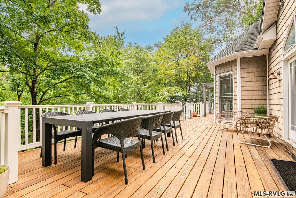 Boathouse & Lake Toys, A covered boathouse with a boat lift and plenty of room for kayaks, paddleboards, and lake toys—everything you need for endless days on the water, all ready and waiting for your enjoyment. - 243 Woodland Rd, Littleton NC 27850, Littleton